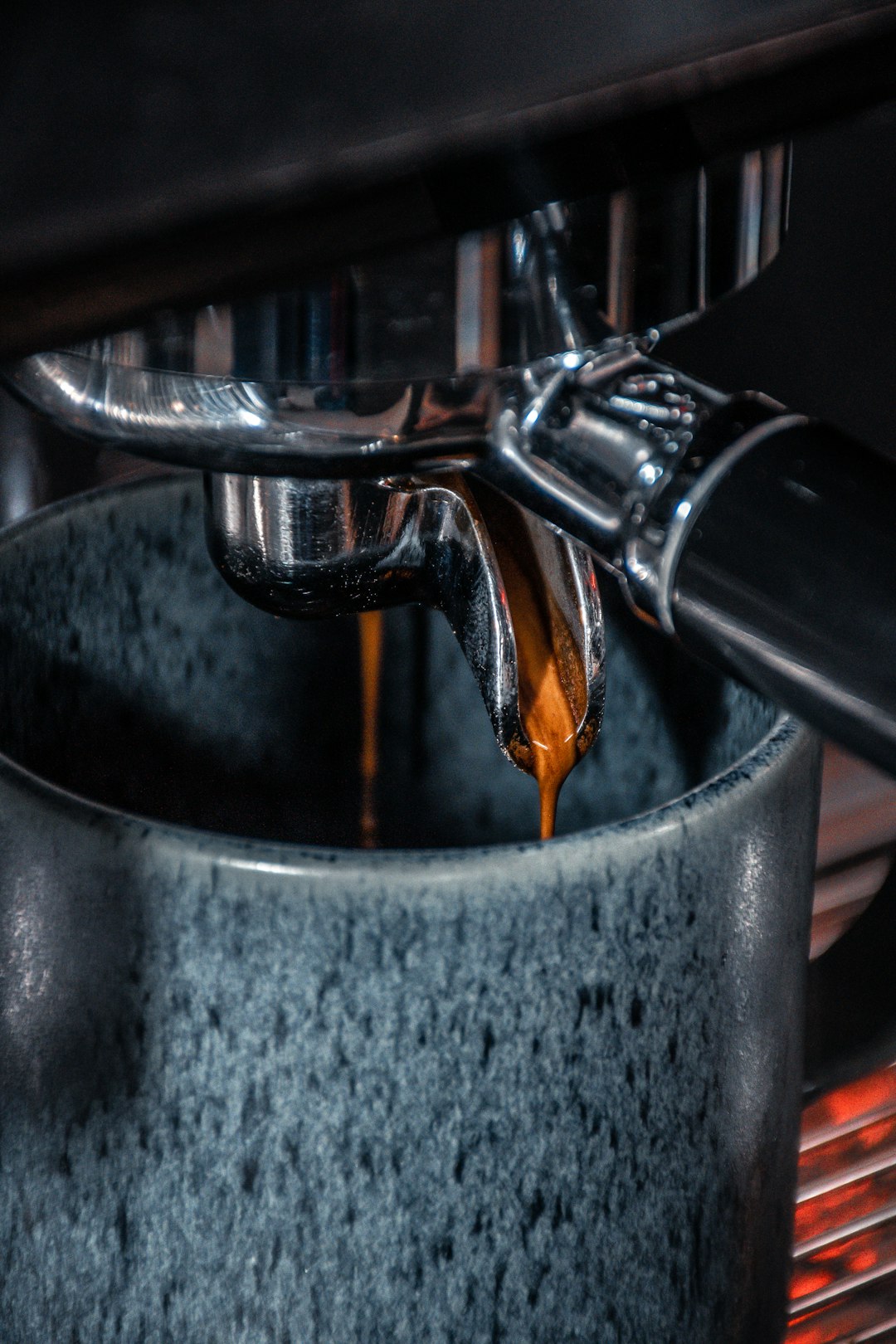 a-close-up-of-a-coffee-cup-being-filled-with-liquid-z5n5eacsq0e